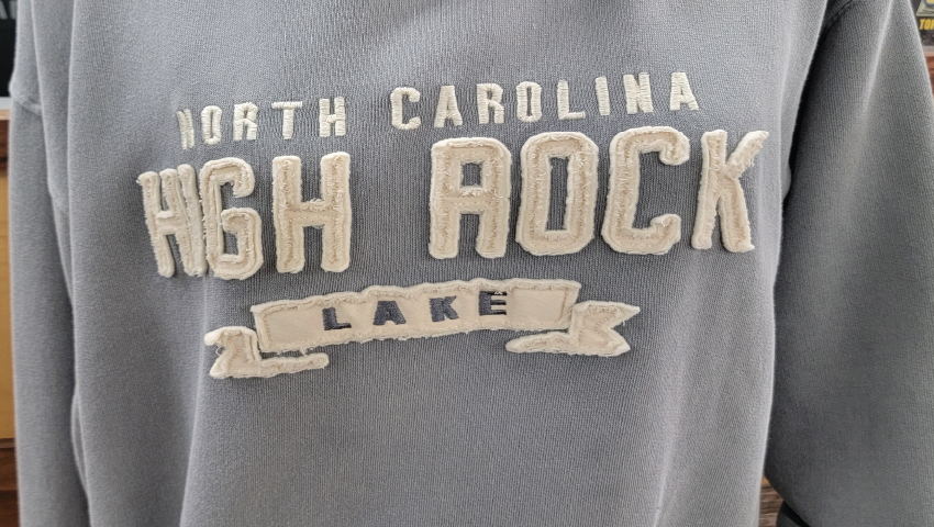 Grey sweatshirt that says "North Carolina High Rock Lake."
